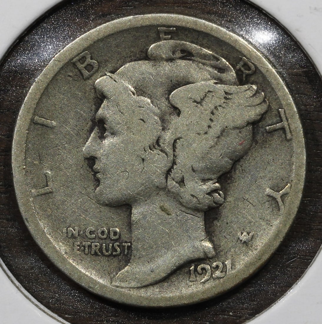 1921 D Denver Mercury Dime 10C Silver Key Date VG: 1921 D Denver Mercury Dime 10C Silver Key Date VG 1921-D Mercury dime with a key date designation. This pre-owned United States 10-cent coin is struck in 90% silver and identified as Very Good (VG) co
