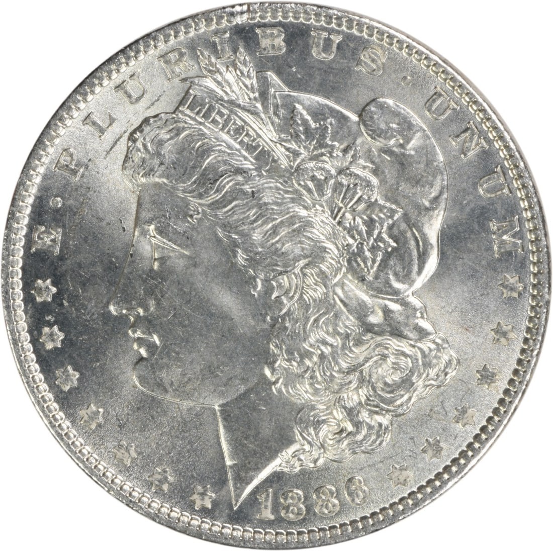 Brilliant Uncirculated 1886 Silver Dollar Morgan Type Uncertified: Brilliant Uncirculated 1886 Silver Dollar Morgan Type Uncertified This is an uncirculated 1886 Morgan Silver Dollar featuring a brilliant uncirculated (BU) grade. Struck in silver, this coin was minte