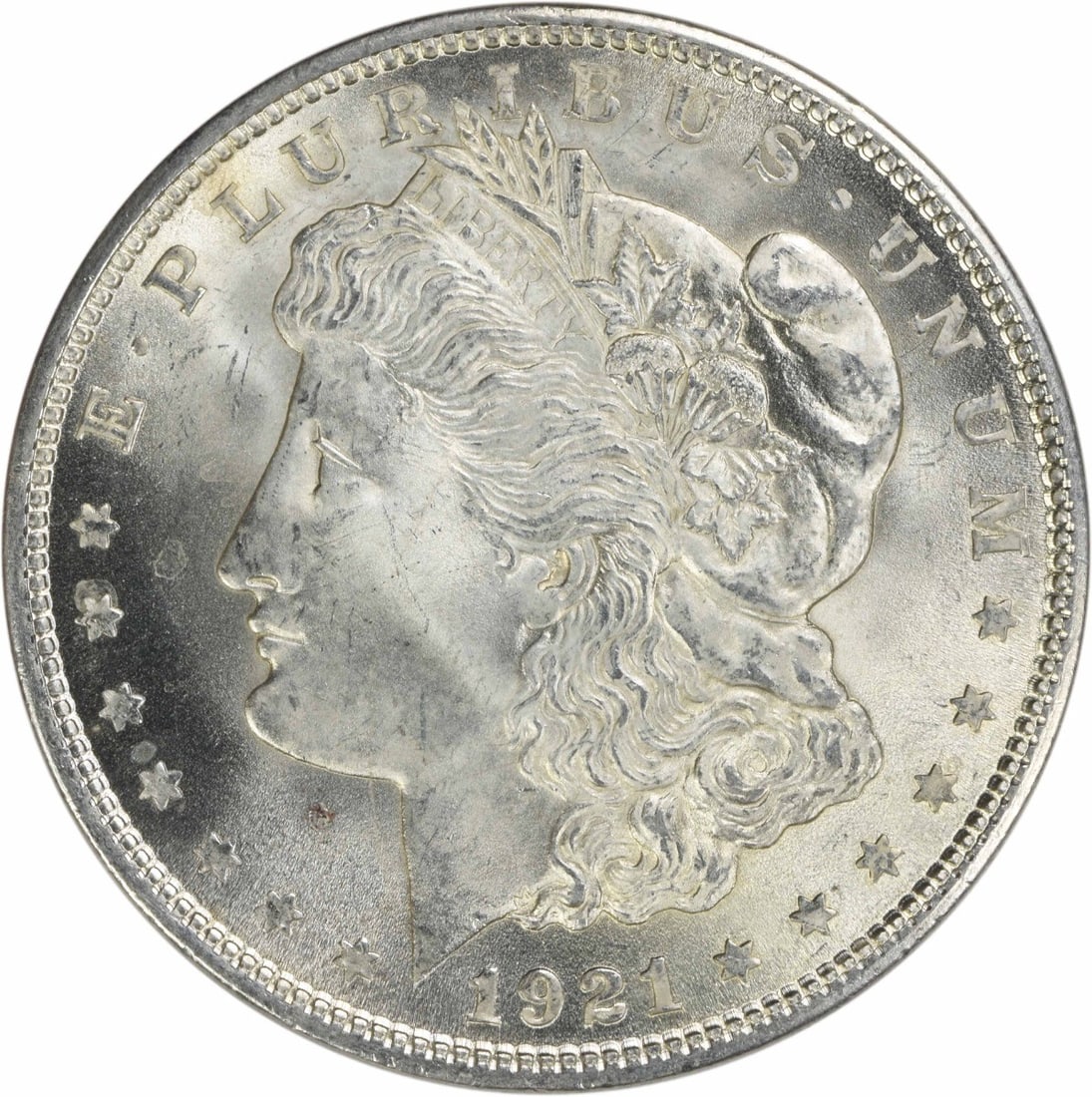 1921 Morgan Dollar Silver Uncirculated Choice BU No Mint Mark: 1921 Morgan Dollar Silver Uncirculated Choice BU No Mint Mark This 1921 Morgan Silver Dollar is a Choice Brilliant Uncirculated (BU) coin. It is composed of silver and was minted in the United States 