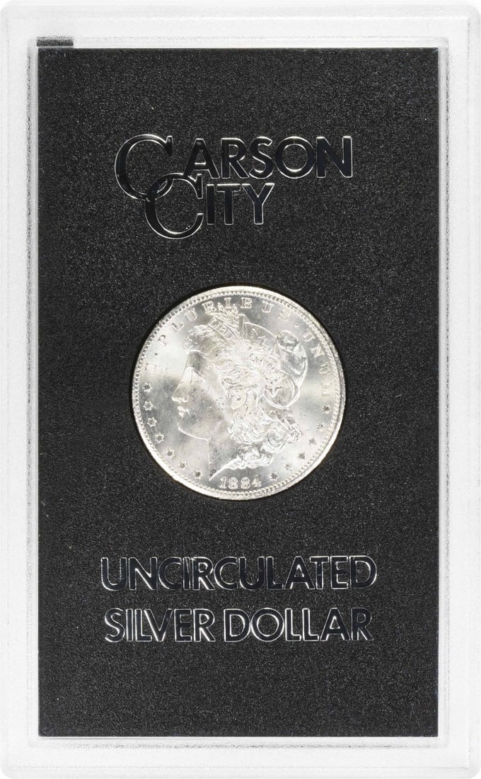 1884 CC Morgan Silver Dollar in GSA Hard Pack Uncertified: 1884 CC Morgan Silver Dollar in GSA Hard Pack Uncertified 1884-CC Morgan Silver Dollar in uncirculated condition, housed in a GSA holder hard pack. This pre-owned coin is composed of silver and is ide