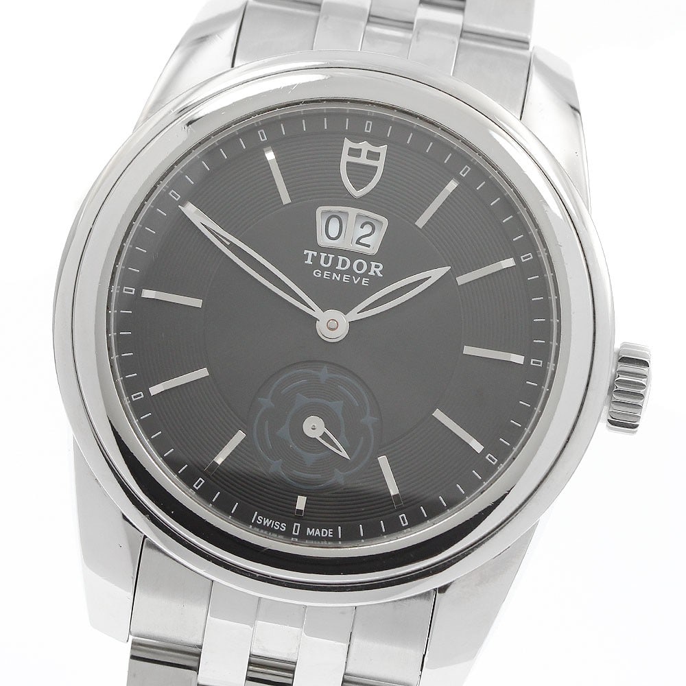 TUDOR Glamour Ref 57000 mens automatic stainless steel wristwatch: TUDOR Glamour Ref 57000 mens automatic stainless steel wristwatch TUDOR Glamour Double Date automatic men's wristwatch with a black dial and stainless steel case and bracelet. Features include date an