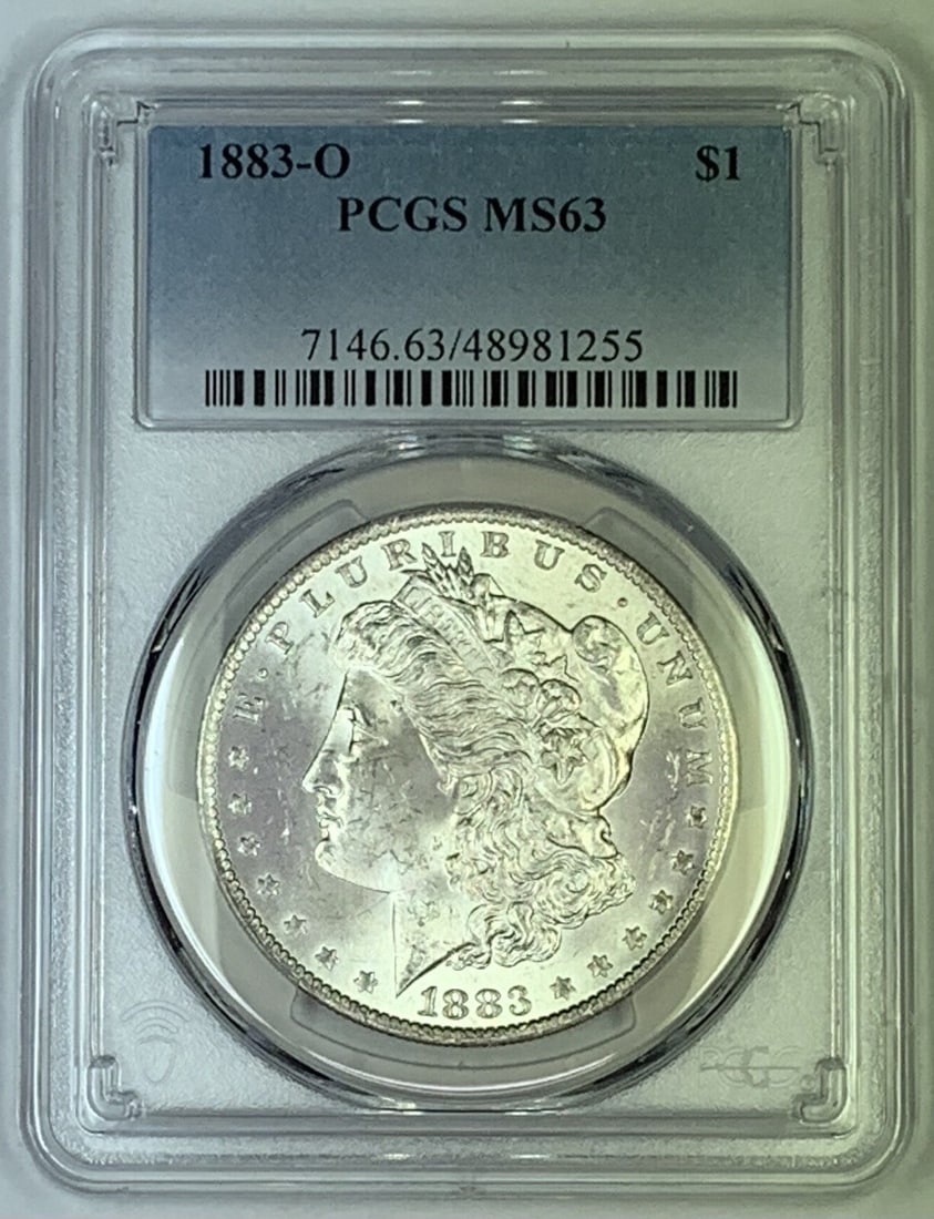 PCGS MS 63 1883-O Morgan Silver Dollar Uncirculated Certified $1 Coin: PCGS MS 63 1883-O Morgan Silver Dollar Uncirculated Certified $1 Coin This is an 1883-O Morgan Silver Dollar coin, certified by PCGS with a grade of MS 63. The coin is uncirculated and composed of sil