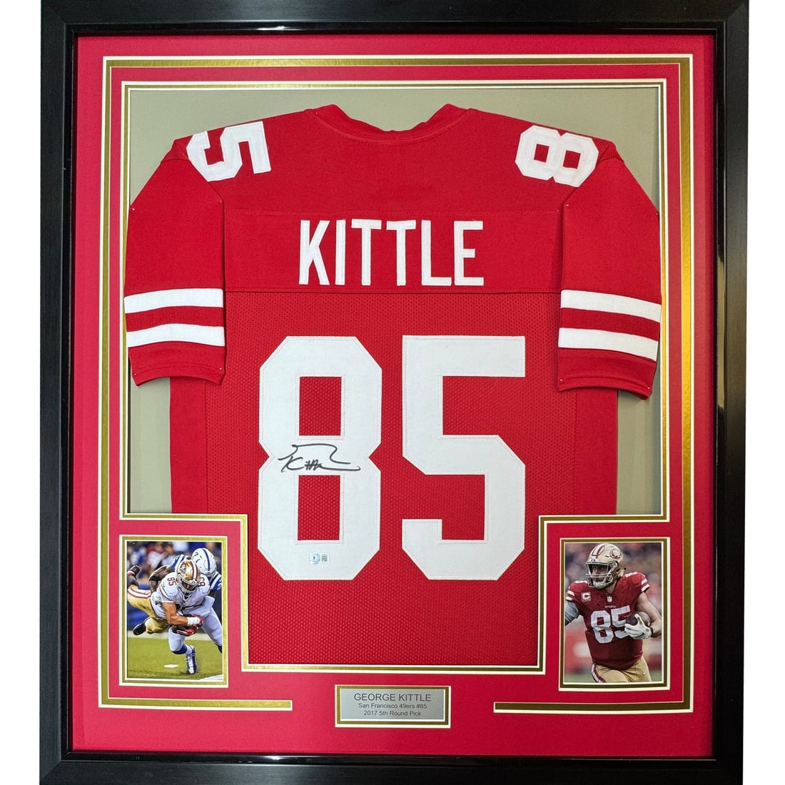 George Kittle autographed framed red football jersey 35x39 Beckett COA: George Kittle autographed framed red football jersey 35x39 Beckett COA Professionally framed and matted signed George Kittle red jersey display featuring two 5x7 photos. This original autographed NFL 