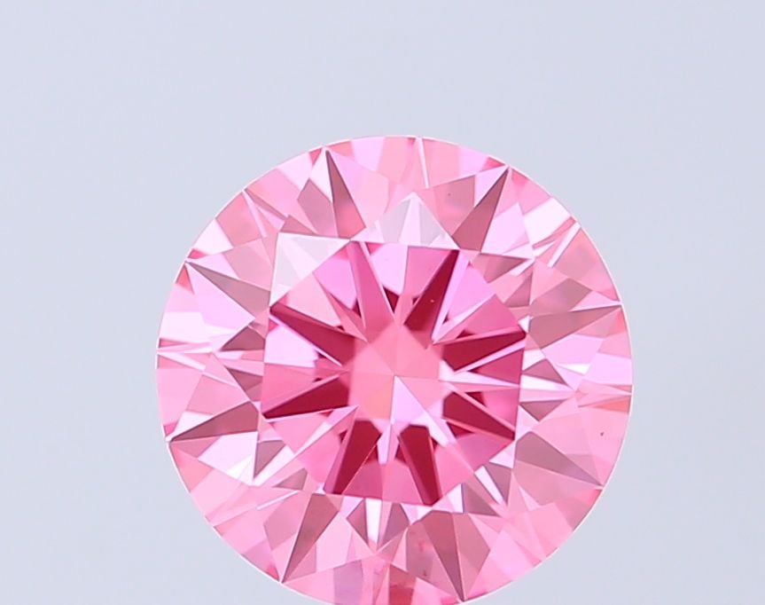 Ideal Loose Diamond - ROUND 1.4ct Fancy Vivid Pink VVS2: Ideal Loose Diamond - ROUND 1.4ct Fancy Vivid Pink VVS2 Source: This is a real non-mined Diamond that has been grown in a lab Shape: ROUND Carats: 1.4 Color: Fancy Vivid Pink Certification: IGI Video: