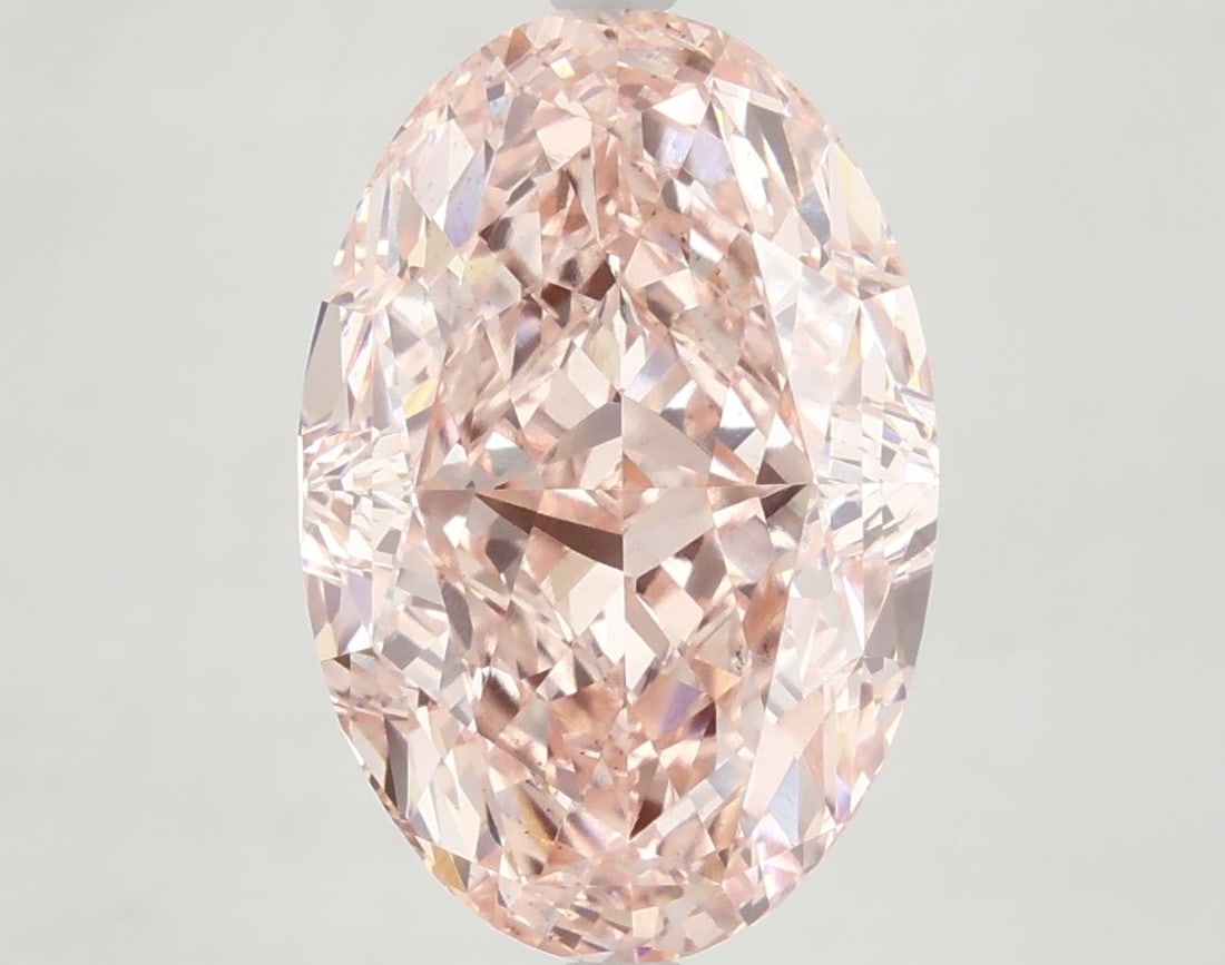Loose Diamond - OVAL 7.08ct Fancy Vivid Pink VS1: Loose Diamond - OVAL 7.08ct Fancy Vivid Pink VS1 Source: This is a real non-mined Diamond that has been grown in a lab Shape: OVAL Carats: 7.08 Color: Fancy Vivid Pink Certification: IGI Video: