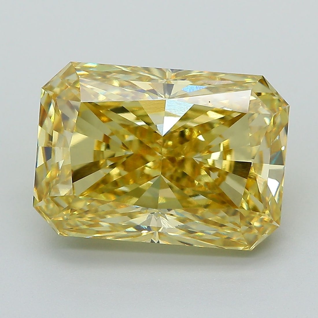 Loose Diamond - RADIANT 7.84ct Fancy Vivid Yellow VVS2: Loose Diamond - RADIANT 7.84ct Fancy Vivid Yellow VVS2 Source: This is a real non-mined Diamond that has been grown in a lab Shape: RADIANT Carats: 7.84 Color: Fancy Vivid Yellow Certification: IGI