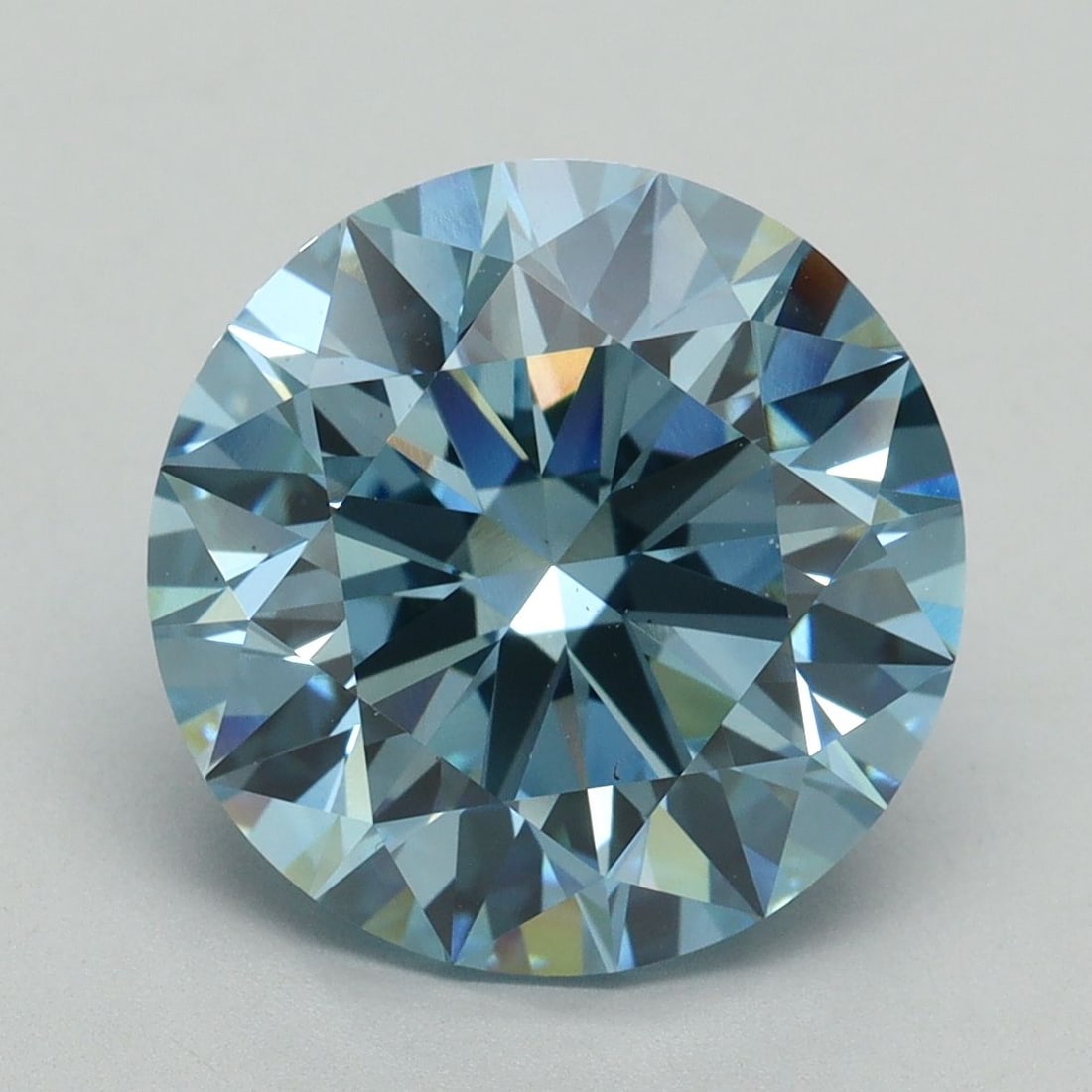 Ideal Loose Diamond - ROUND 6.18ct Fancy Vivid Blue VS2: Ideal Loose Diamond - ROUND 6.18ct Fancy Vivid Blue VS2 Source: This is a real non-mined Diamond that has been grown in a lab Shape: ROUND Carats: 6.18 Color: Fancy Vivid Blue Certification: IGI Video