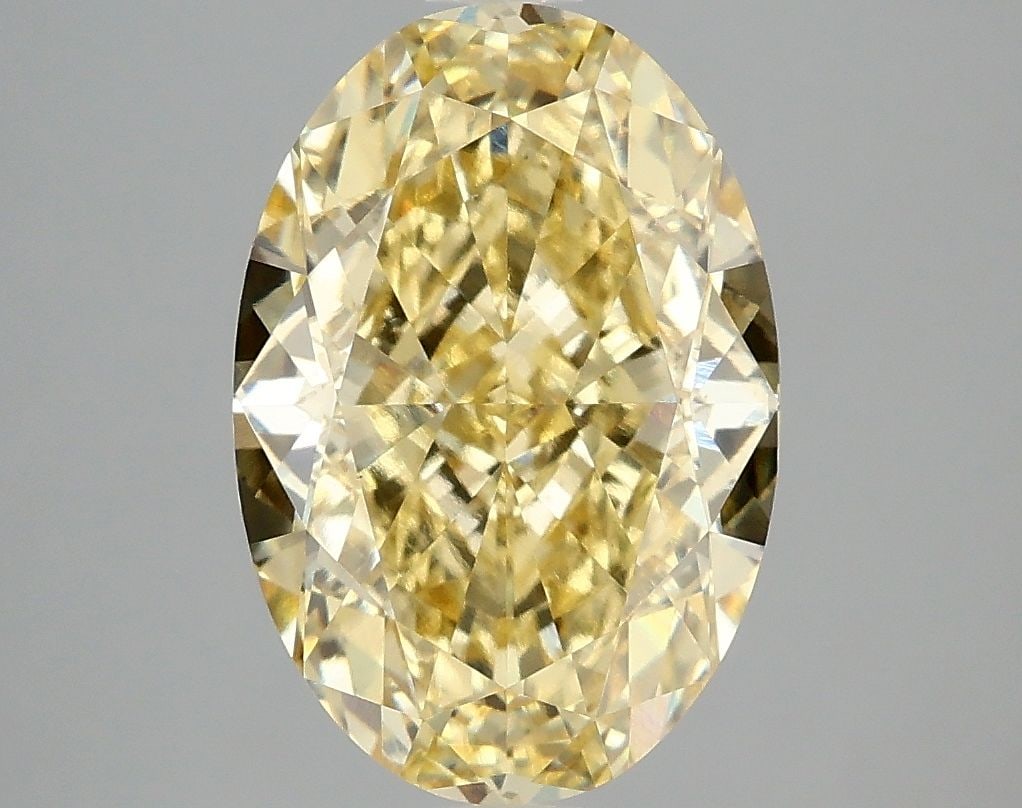 Loose Diamond - OVAL 4.1ct Fancy Vivid Yellow VS1: Loose Diamond - OVAL 4.1ct Fancy Vivid Yellow VS1 Source: This is a real non-mined Diamond that has been grown in a lab Shape: OVAL Carats: 4.1 Color: Fancy Vivid Yellow Certification: IGI Video: