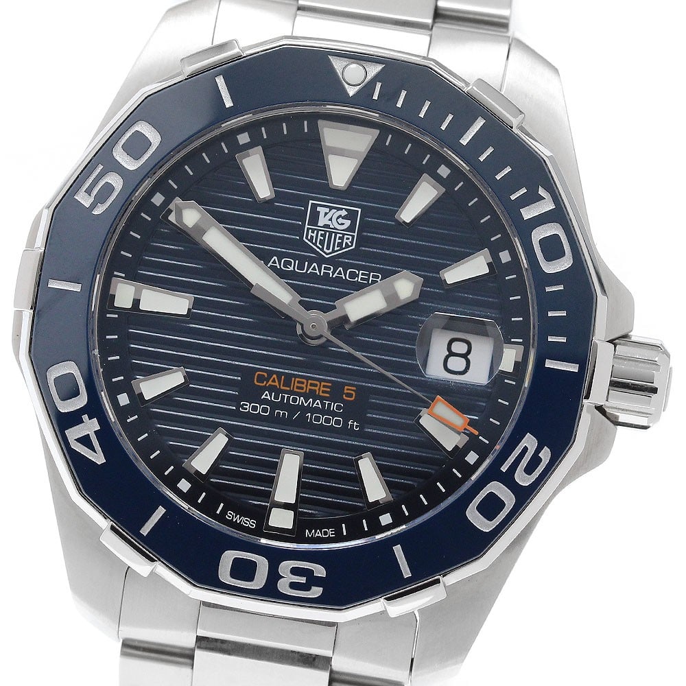 TAG Heuer Aquaracer Caliber 5 automatic mens date watch WAY211C-1: TAG Heuer Aquaracer Caliber 5 automatic mens date watch WAY211C-1 TAG Heuer Aquaracer Caliber 5 men's wristwatch with automatic movement and date function. This Swiss-made watch features a navy dial w