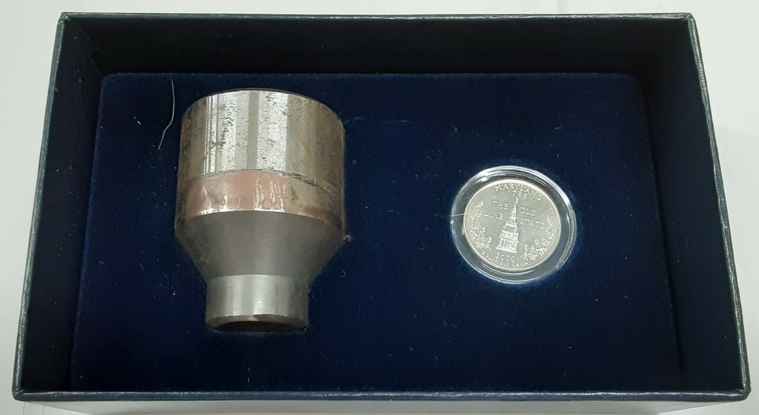 2000-D Maryland Quarter and Mint Die Set with Box and Certificate: 2000-D Maryland Quarter and Mint Die Set with Box and Certificate This set includes a 2000-D Maryland Statehood Quarter from the United States Mint's 50 State Quarters program, along with an original 