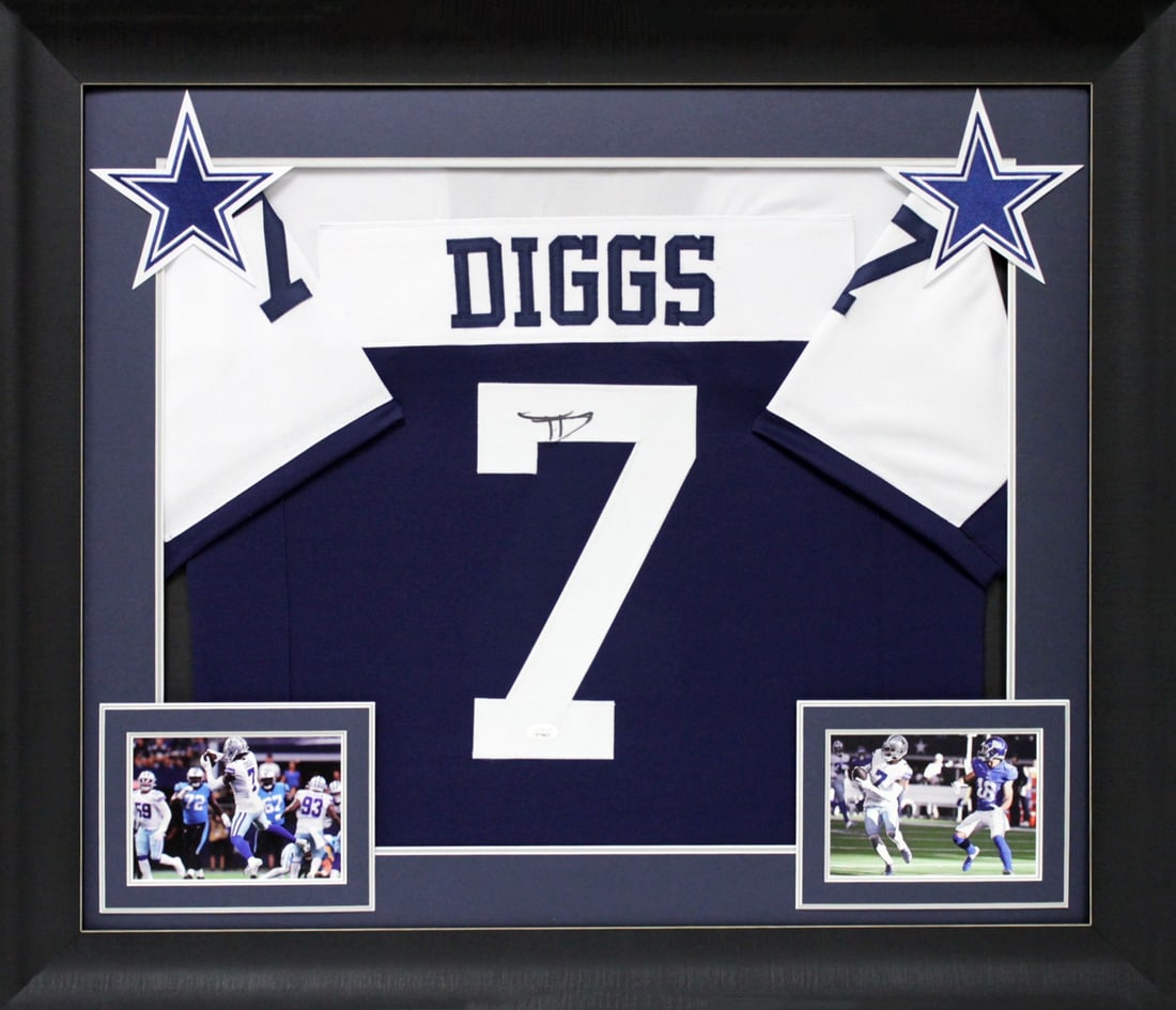 Framed Trevon Diggs Autographed Dallas Cowboys Navy Thanksgiving Jersey JSA: Framed Trevon Diggs Autographed Dallas Cowboys Navy Thanksgiving Jersey JSA Professionally framed Thanksgiving navy blue pro style jersey signed by Trevon Diggs. This original autographed piece includ