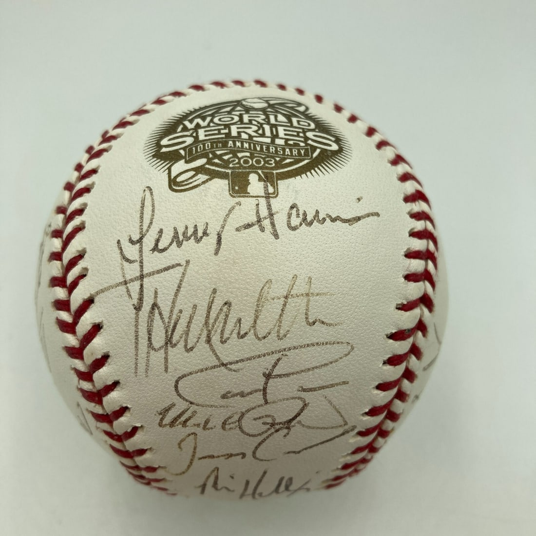 2003 Florida Marlins Team Signed World Series Baseball with MLB Hologram: 2003 Florida Marlins Team Signed World Series Baseball with MLB Hologram Celebrate the 2003 Florida Marlins' historic World Series victory with this team-signed baseball, a true gem for any collector.