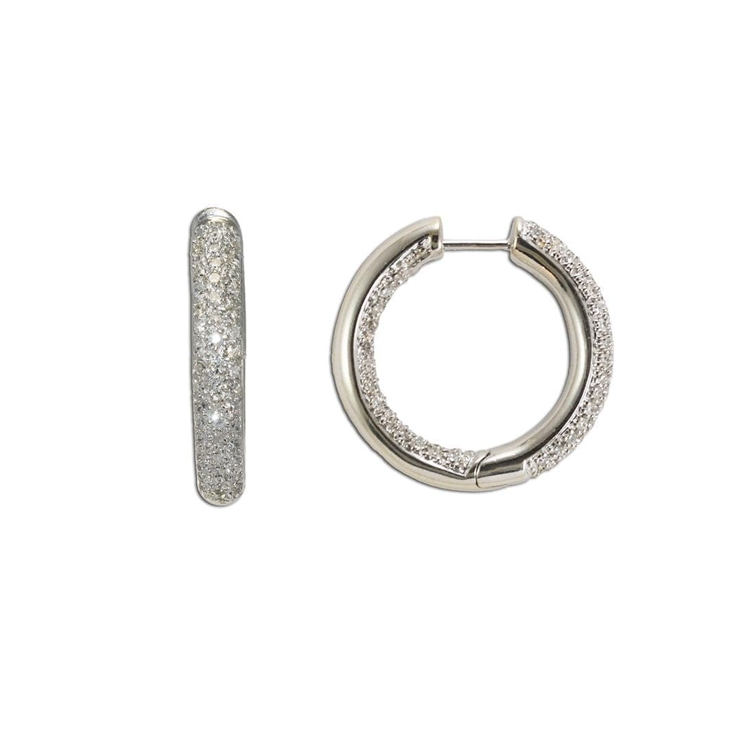 Diamond Cluster Hoop Earrings in 14K White Gold 1.00ct: Diamond Cluster Hoop Earrings in 14K White Gold 1.00ct Pre-owned 14k white gold hoop earrings set with natural diamonds in a cluster setting. The diamonds are arranged along the outside and inside of 