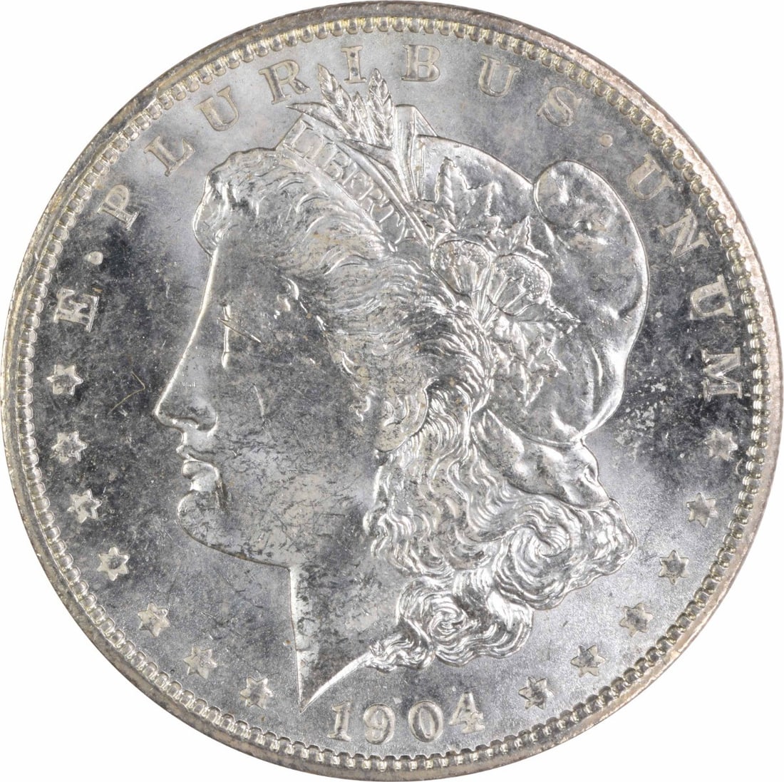 1904 O Morgan Silver Dollar Uncirculated Uncertified $1 Coin: 1904 O Morgan Silver Dollar Uncirculated Uncertified $1 Coin 1904-O Morgan Silver Dollar in uncirculated condition. This pre-owned coin is uncertified and features the classic Morgan design by George 