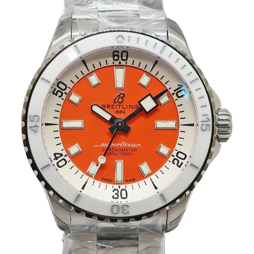 Breitling A17377 Superocean Automatic 36 Orange Dial Watch: Breitling A17377 Superocean Automatic 36 Orange Dial Watch Breitling Superocean Automatic 36 wristwatch with a compact stainless steel case, sapphire crystal, automatic movement, and distinctive orang