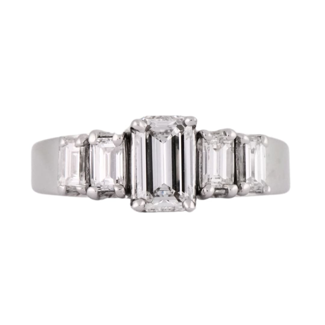 GIA Certified 14K White Gold Emerald Cut Diamond Ring 0.63 CT Center: GIA Certified 14K White Gold Emerald Cut Diamond Ring 0.63 CT Center Pre-owned 14K white gold engagement ring featuring an all-emerald cut three-stone diamond design. The center diamond is a natural 0