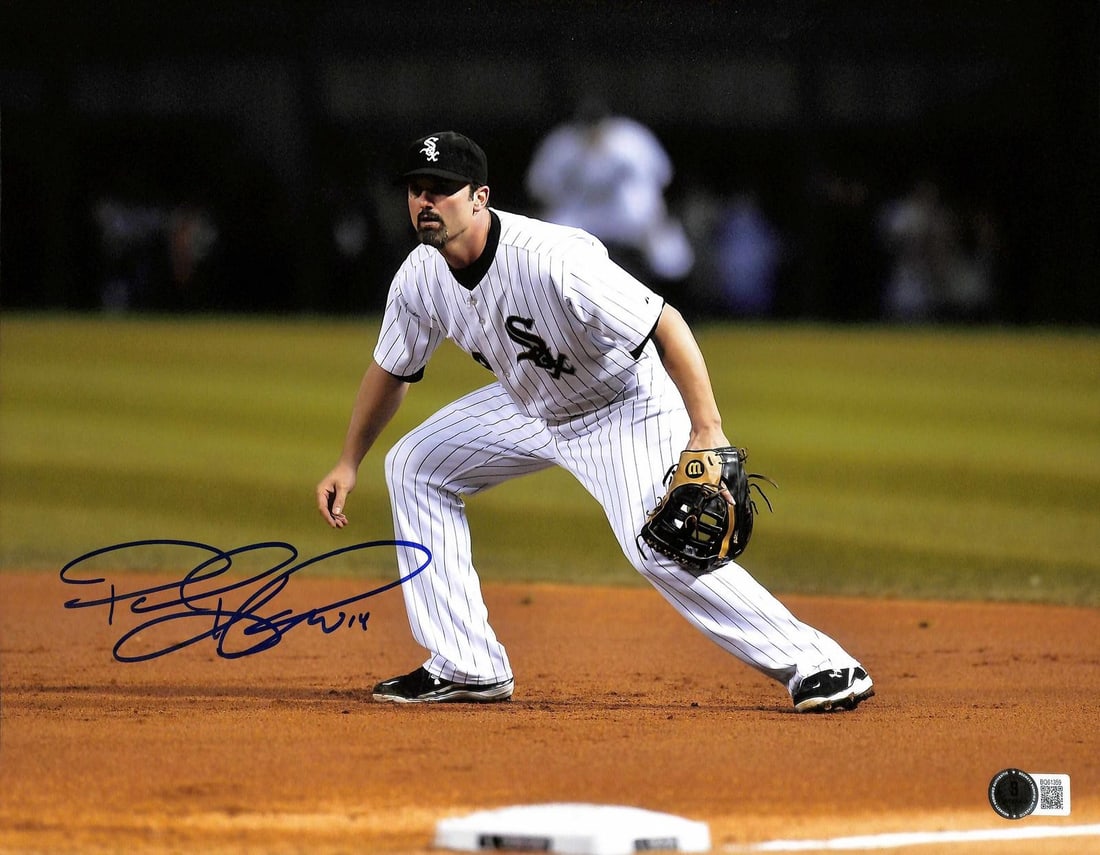 Beckett Certified Paul Konerko White Sox Signed 11x14 Photo: Beckett Certified Paul Konerko White Sox Signed 11x14 Photo This 11x14 photograph features former Chicago White Sox star Paul Konerko in action, wearing his team uniform. The photo has been personally