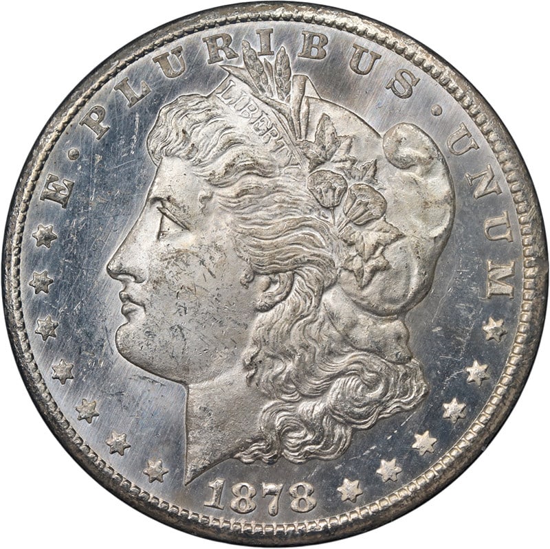 NGC MS63 DPL 1878-CC GSA Morgan Silver Dollar: NGC MS63 DPL 1878-CC GSA Morgan Silver Dollar Original 1878-CC GSA Morgan Silver Dollar certified by NGC as MS63 DPL. This uncirculated silver coin offers nice eye appeal, fantastic luster, and a stro
