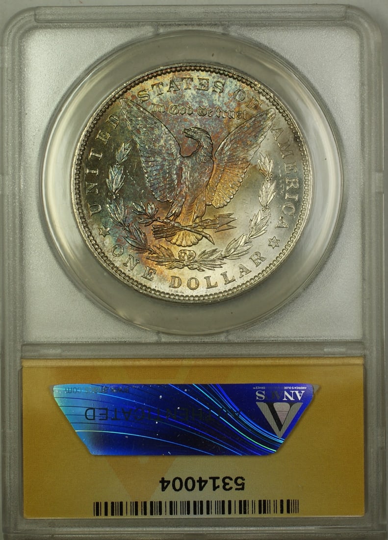 ANACS MS 63 1887 Morgan Dollar Silver $1 Toned Reverse: ANACS MS 63 1887 Morgan Dollar Silver $1 Toned Reverse 1887 Morgan Silver Dollar $1 coin graded MS 63 by ANACS. This uncirculated United States silver coin is identified as a Morgan Dollar and feature