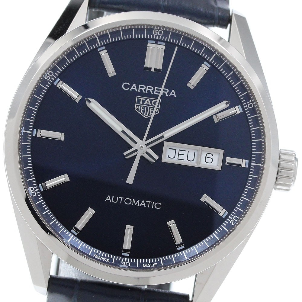 TAG Heuer Carrera Calibre 5 Day-Date Automatic Watch WBN2012: TAG Heuer Carrera Calibre 5 Day-Date Automatic Watch WBN2012 TAG Heuer Carrera Calibre 5 Day-Date automatic men's wristwatch with a stainless steel case, navy dial, and leather strap. This watch-only 