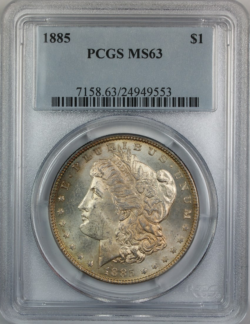 PCGS MS-63 1885 Morgan Dollar with Multicolor Toning: PCGS MS-63 1885 Morgan Dollar with Multicolor Toning This 1885 Morgan Silver Dollar was minted in Philadelphia and is certified by PCGS with a grade of MS-63. Composed of 90% silver, the coin features