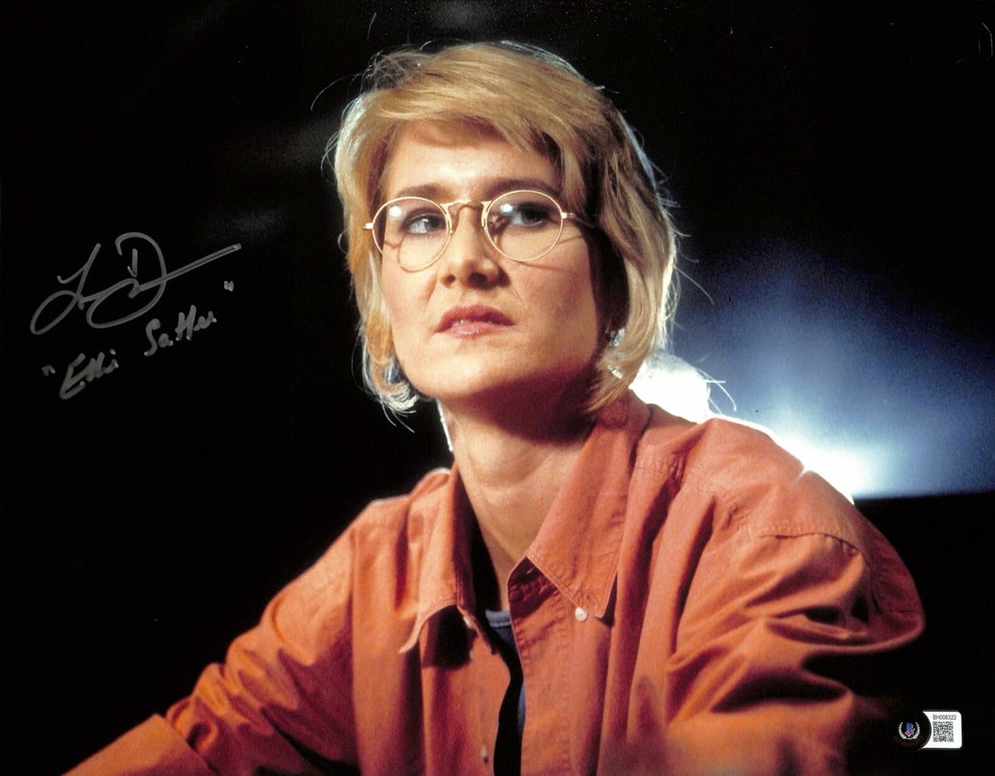 Beckett Certified Laura Dern Signed Jurassic Park Ellie Sattler 11x14 Photo: Beckett Certified Laura Dern Signed Jurassic Park Ellie Sattler 11x14 Photo Original 11x14 photograph signed by Laura Dern as Ellie Sattler from Jurassic Park. The autograph is authenticated by Becket