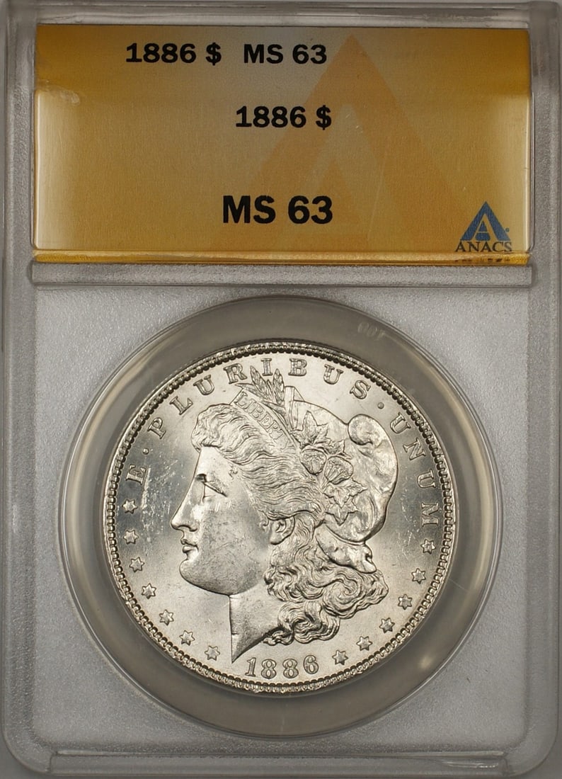ANACS MS-63 1886 Morgan Silver Dollar: ANACS MS-63 1886 Morgan Silver Dollar This 1886 Morgan Silver Dollar is graded MS-63 by ANACS. Struck in Philadelphia, it features the classic Morgan design and is composed of silver. The coin is unci