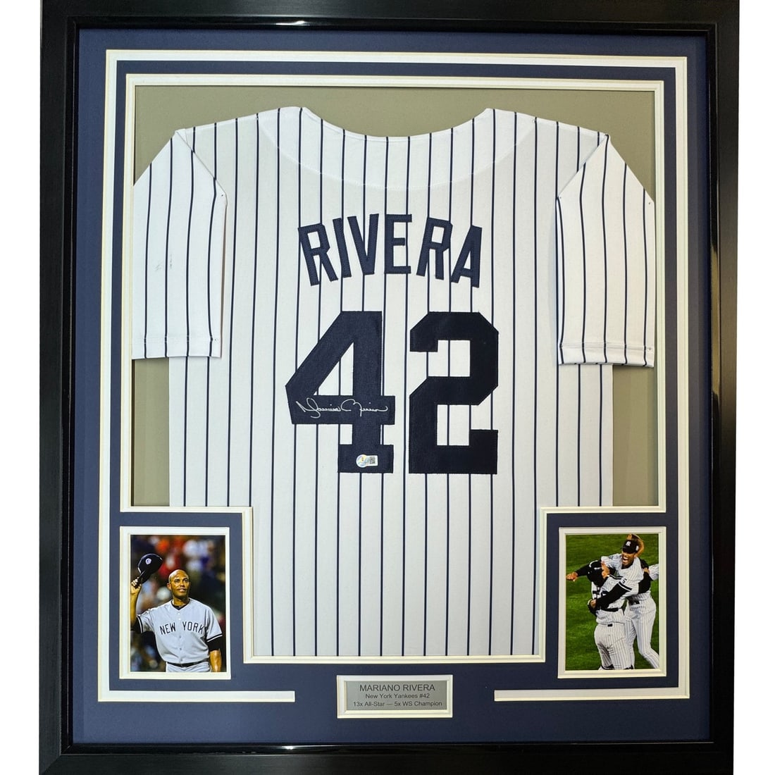 35x39 Framed Mariano Rivera Signed Yankees Jersey JSA COA: 35x39 Framed Mariano Rivera Signed Yankees Jersey JSA COA Professionally framed autographed Mariano Rivera New York Yankees jersey display, matted with two 5x7 photos and ready to hang. This original 