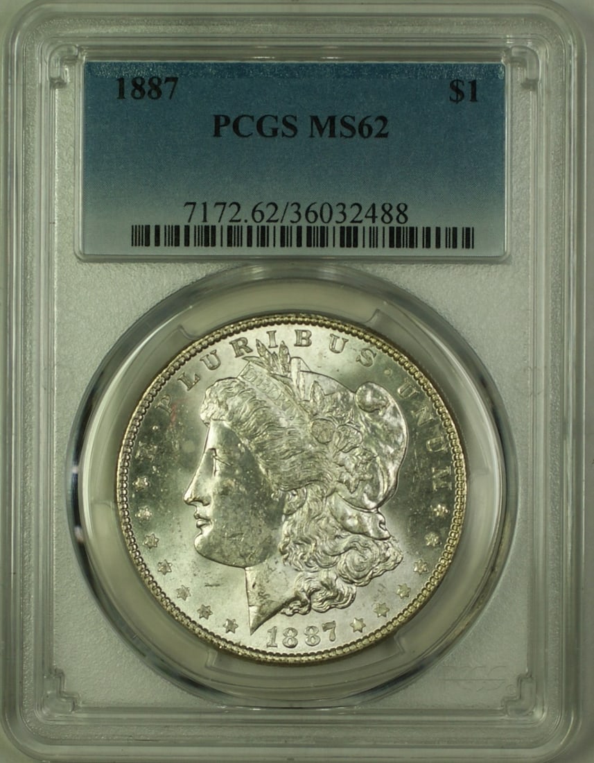 PCGS MS-62 1887 Morgan Dollar Silver $1 Coin: PCGS MS-62 1887 Morgan Dollar Silver $1 Coin This is an 1887 Morgan Silver Dollar $1 coin certified by PCGS with a grade of MS-62. Minted in Philadelphia, this uncirculated coin is composed of silver 