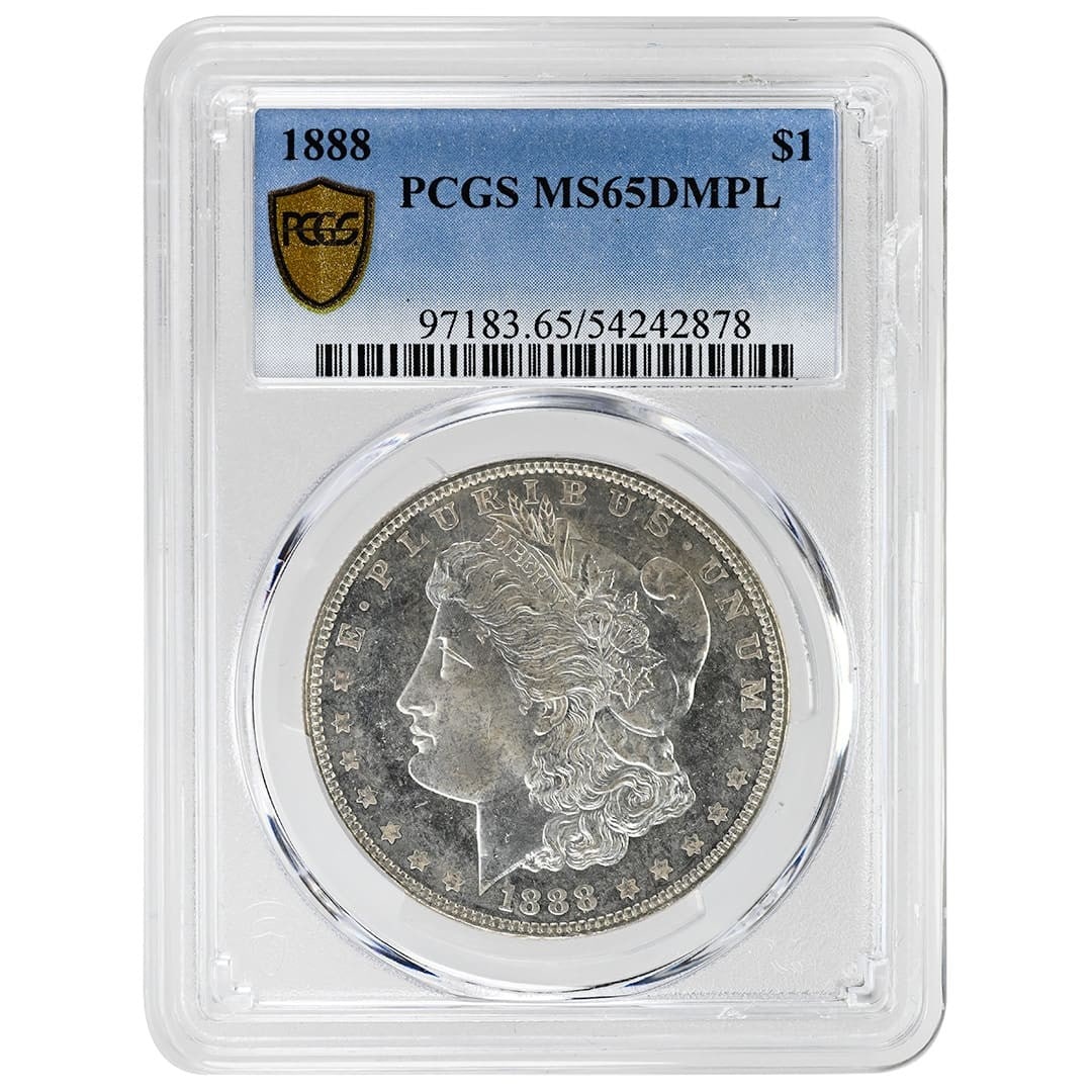 PCGS MS65 DMPL 1888 $1 Morgan Silver Dollar: PCGS MS65 DMPL 1888 $1 Morgan Silver Dollar 1888 Morgan Silver Dollar graded PCGS MS65 DMPL. This pre-owned silver dollar is a mostly white example with a small darker patch low on Liberty's chin. PCG