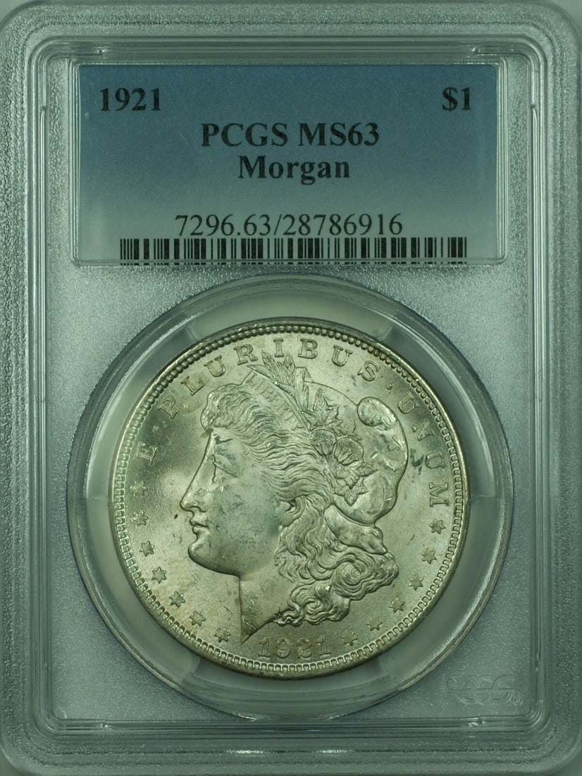 PCGS MS 63 1921 Morgan Dollar $1 Silver Coin: PCGS MS 63 1921 Morgan Dollar $1 Silver Coin This 1921 Morgan Silver Dollar is an uncirculated $1 coin from the United States, minted in Philadelphia. It is composed of silver with a fineness of 0.9 a