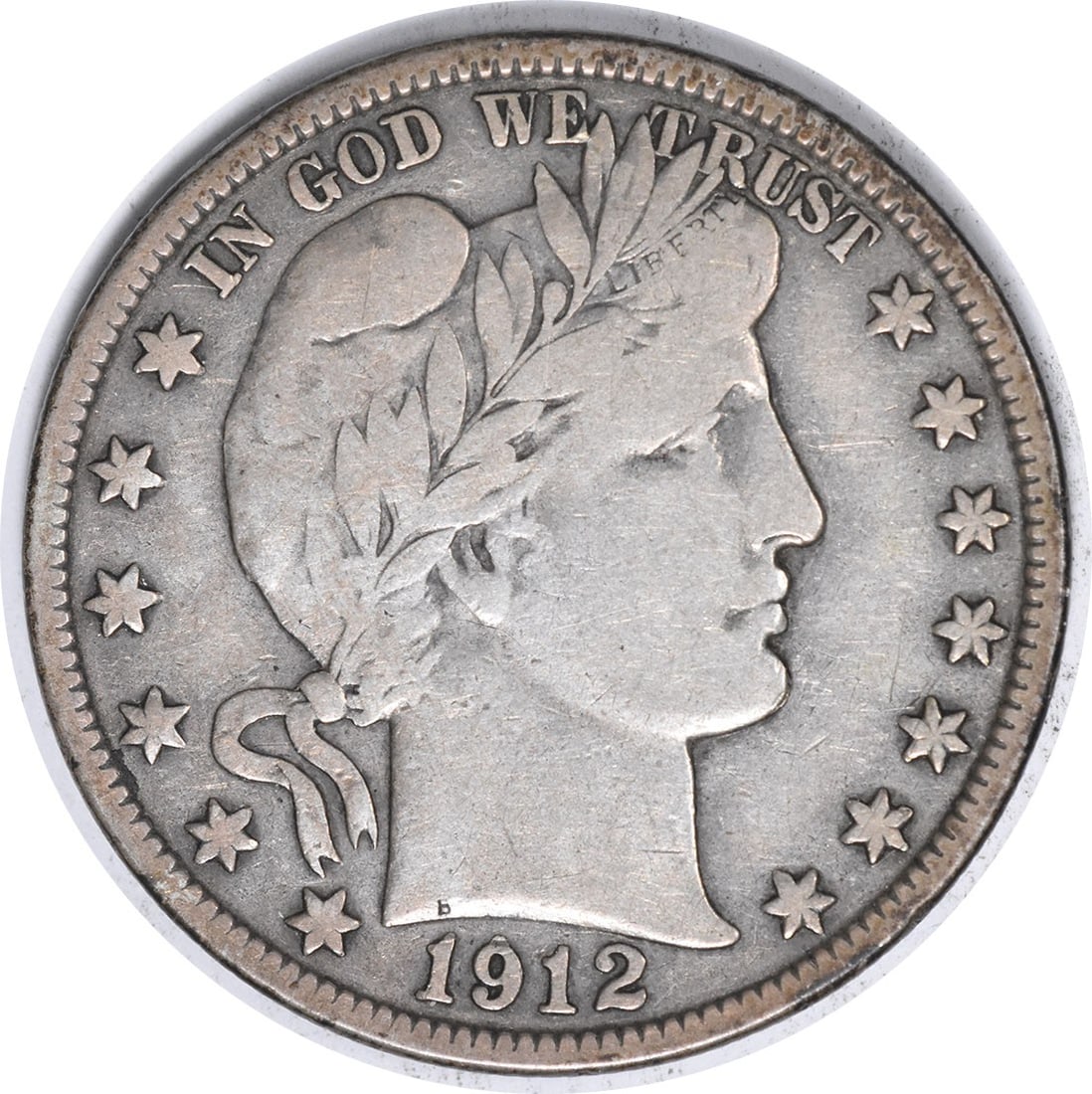 1912 S Barber 50C Silver Half Dollar VF Uncertified: 1912 S Barber 50C Silver Half Dollar VF Uncertified 1912-S Barber silver half dollar in VF grade. This circulated, uncertified United States 50C coin is a pre-owned example of the Barber series. Speci