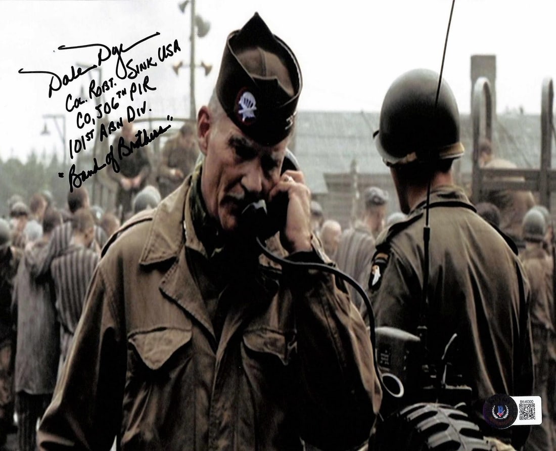 Beckett Authenticated Dale Dye Signed Band of Brothers 8x10 Photo: Beckett Authenticated Dale Dye Signed Band of Brothers 8x10 Photo This 8x10 color photograph from the acclaimed HBO miniseries Band of Brothers is hand-signed and inscribed by Dale Dye, who portrayed 