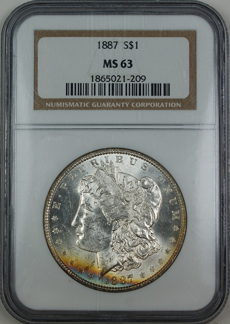 NGC MS-63 1887 Morgan Silver Dollar with Obverse Edge Toning: NGC MS-63 1887 Morgan Silver Dollar with Obverse Edge Toning 1887 Morgan Silver Dollar certified by NGC as MS-63. This uncirculated coin features multicolor edge toning on the obverse and is housed in