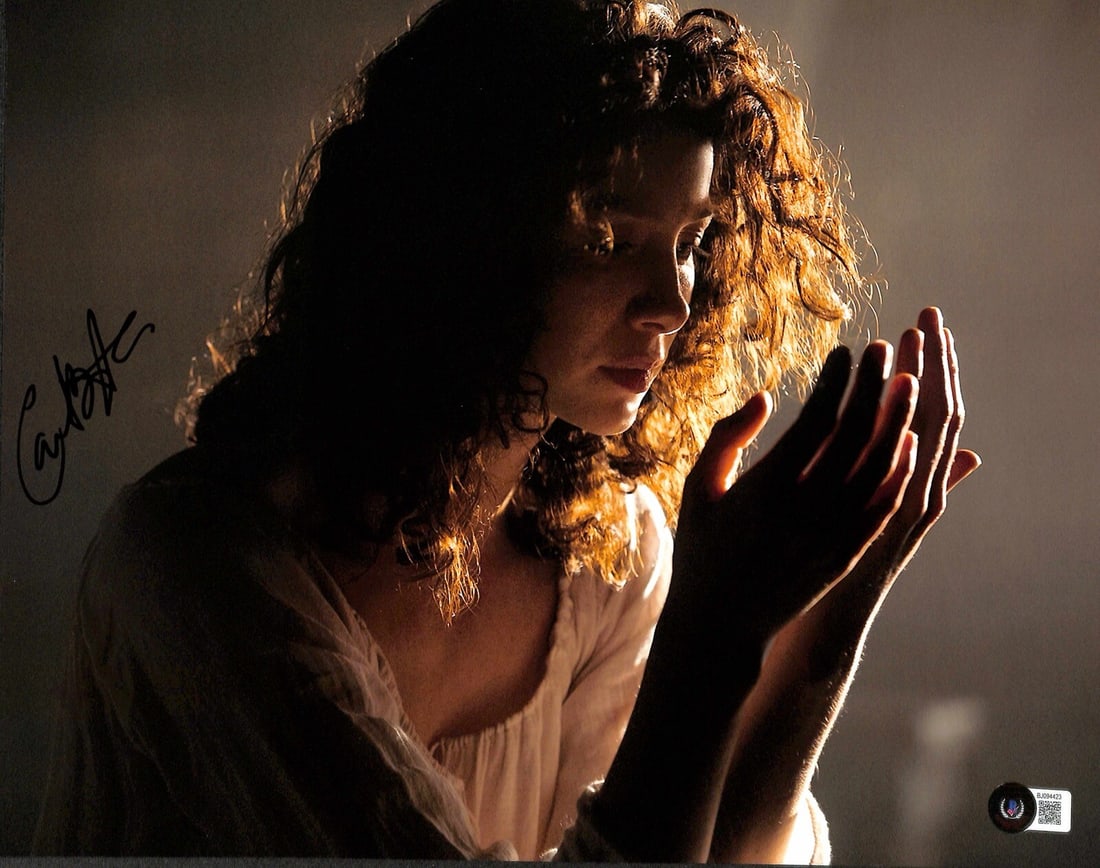 Beckett Certified Caitriona Balfe Signed Outlander 11x14 Photo: Beckett Certified Caitriona Balfe Signed Outlander 11x14 Photo Original 11x14 autographed photograph signed by Caitriona Balfe in black permanent marker. The photo features the actress known for playi