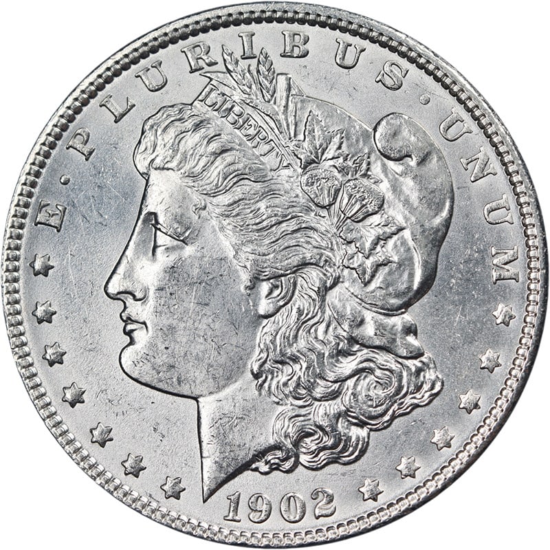 1902 P Morgan Silver Dollar Choice BU: 1902 P Morgan Silver Dollar Choice BU This 1902-P Morgan Silver Dollar is an uncirculated coin featuring exceptional eye appeal, brilliant luster, and a strong strike. The coin displays bright white s
