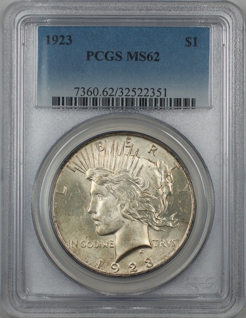 PCGS MS62 1923 Peace Dollar Silver $1 Coin: PCGS MS62 1923 Peace Dollar Silver $1 Coin 1923 Peace Dollar certified by PCGS and graded MS-62. This silver $1 coin is a pre-owned example from the United States. Specifications Coin Type: Peace Doll