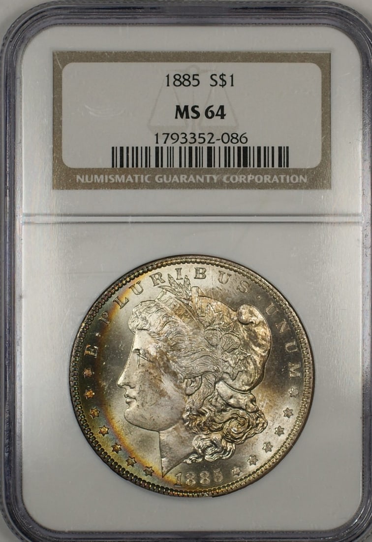 1885 NGC MS 64 Morgan Silver Dollar Toned: 1885 NGC MS 64 Morgan Silver Dollar Toned 1885 Morgan Silver Dollar $1 coin with an NGC MS-64 grade and uncirculated status. This silver coin features toned surfaces, including attractive crescent rim