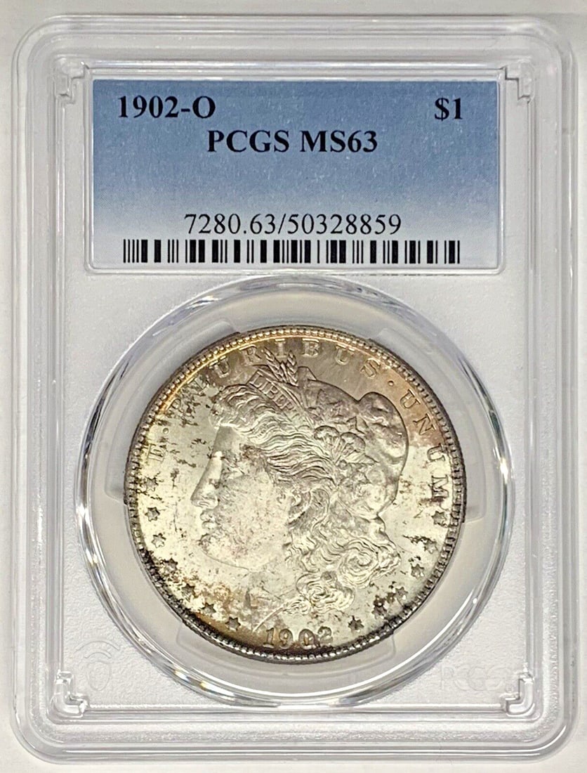 PCGS MS 63 1902-O Morgan Dollar Silver Coin with Toning: PCGS MS 63 1902-O Morgan Dollar Silver Coin with Toning This 1902-O Morgan Silver Dollar features attractive toning and is certified by PCGS with a grade of MS 63. Struck in silver, it is uncirculated