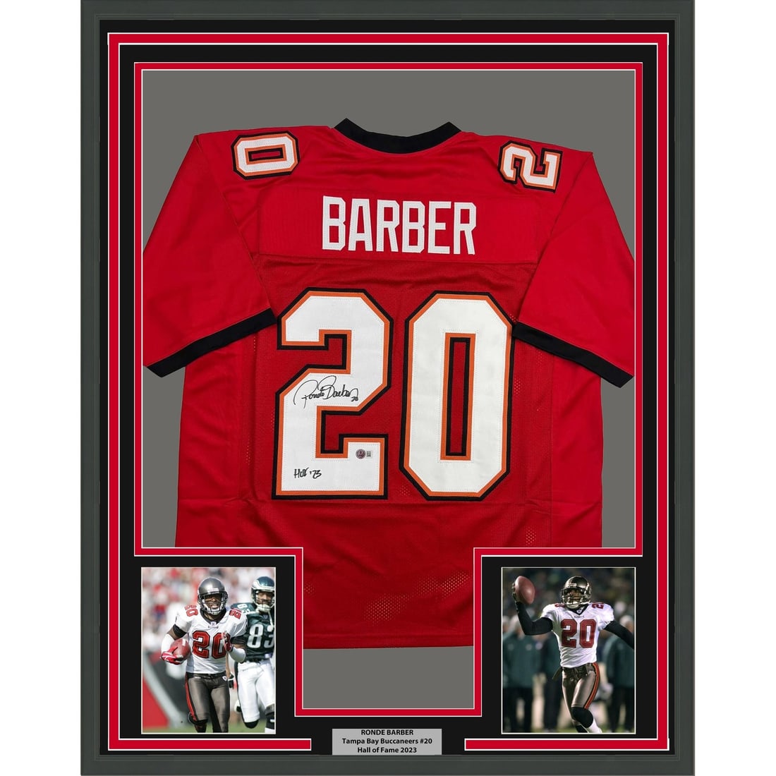 Ronde Barber autographed framed red Buccaneers jersey 35x39 Beckett COA: Ronde Barber autographed framed red Buccaneers jersey 35x39 Beckett COA Professionally framed and matted signed Ronde Barber Tampa Bay Buccaneers red jersey. This original football collectible include