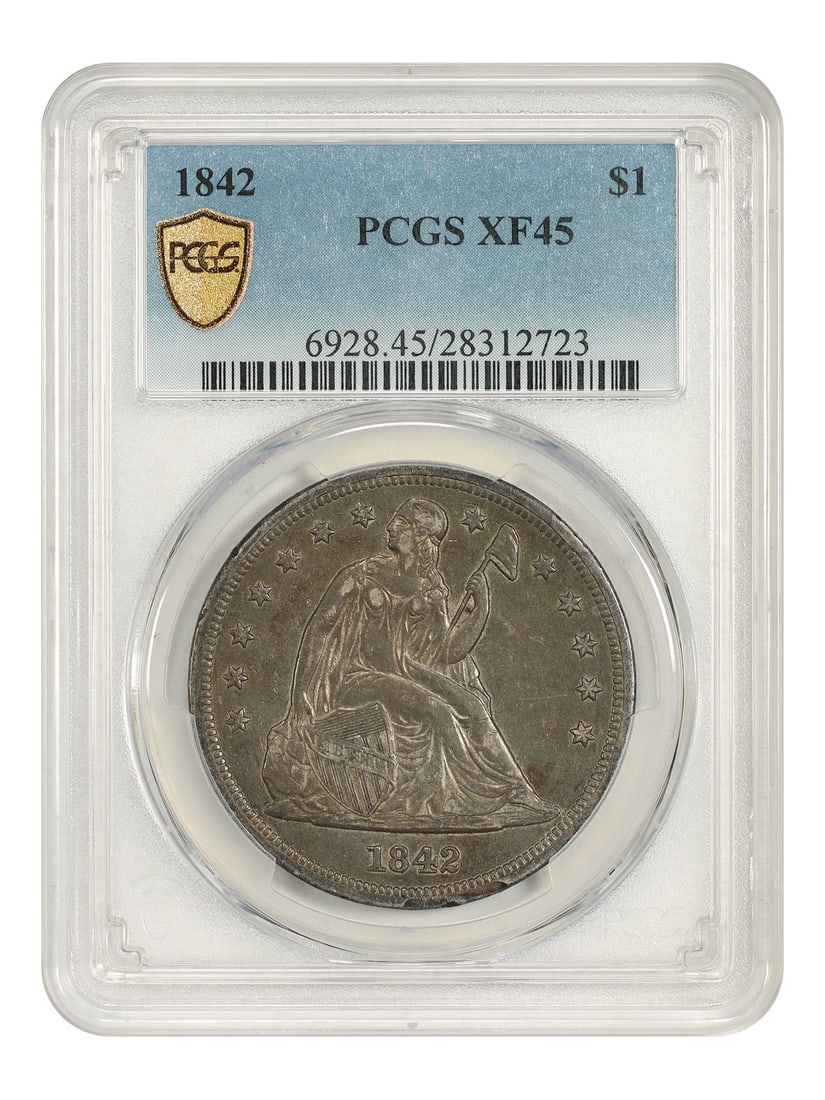 1842 Liberty Seated Silver Dollar PCGS XF45 Philadelphia Issue: 1842 Liberty Seated Silver Dollar PCGS XF45 Philadelphia Issue 1842 Liberty Seated Dollar certified by PCGS in XF45 condition. This circulated example is a low mintage date, with 184,618 coins struck.