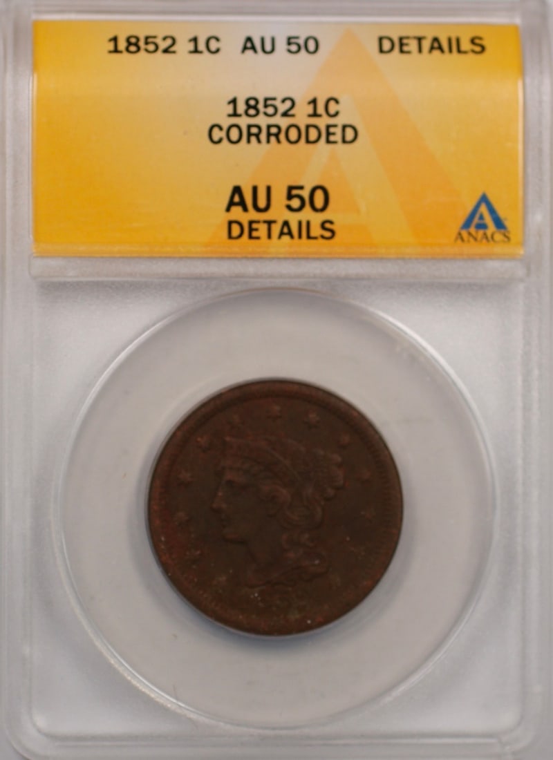 1852 Braided Hair Large Cent Copper Coin ANACS AU 50 Corroded Details: 1852 Braided Hair Large Cent Copper Coin ANACS AU 50 Corroded Details This is an 1852 Braided Hair Large Cent from the United States, certified by ANACS with a grade of AU 50 Details. The coin was min
