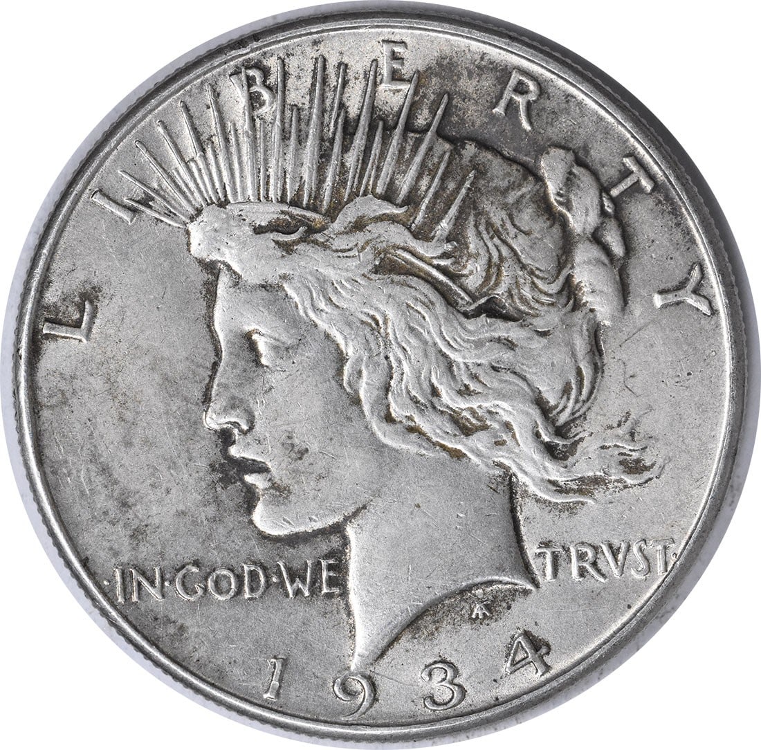 1934 US Peace Dollar Silver $1 AU Uncertified Coin: 1934 US Peace Dollar Silver $1 AU Uncertified Coin 1934 Peace Silver Dollar in AU slider grade. This pre-owned coin is an uncertified, circulated example struck in silver and issued in the United Stat