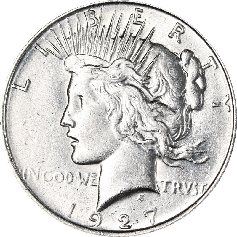 1927 D United States Silver Peace Dollar: 1927 D United States Silver Peace Dollar This is a 1927-D Peace Dollar from the United States, struck in silver with a fineness of 0.9. The coin is circulated and comes uncertified. It is a pre-owned 