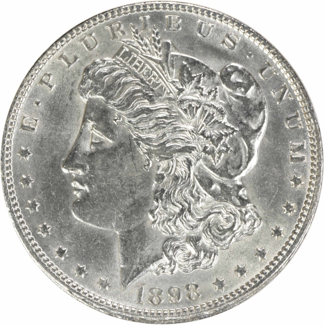 1898 Silver Morgan Dollar Brilliant Uncirculated Uncertified Coin: 1898 Silver Morgan Dollar Brilliant Uncirculated Uncertified Coin This 1898 Morgan Silver Dollar is an uncirculated coin with brilliant uncirculated (BU) grade. It is composed of silver, has no mint m