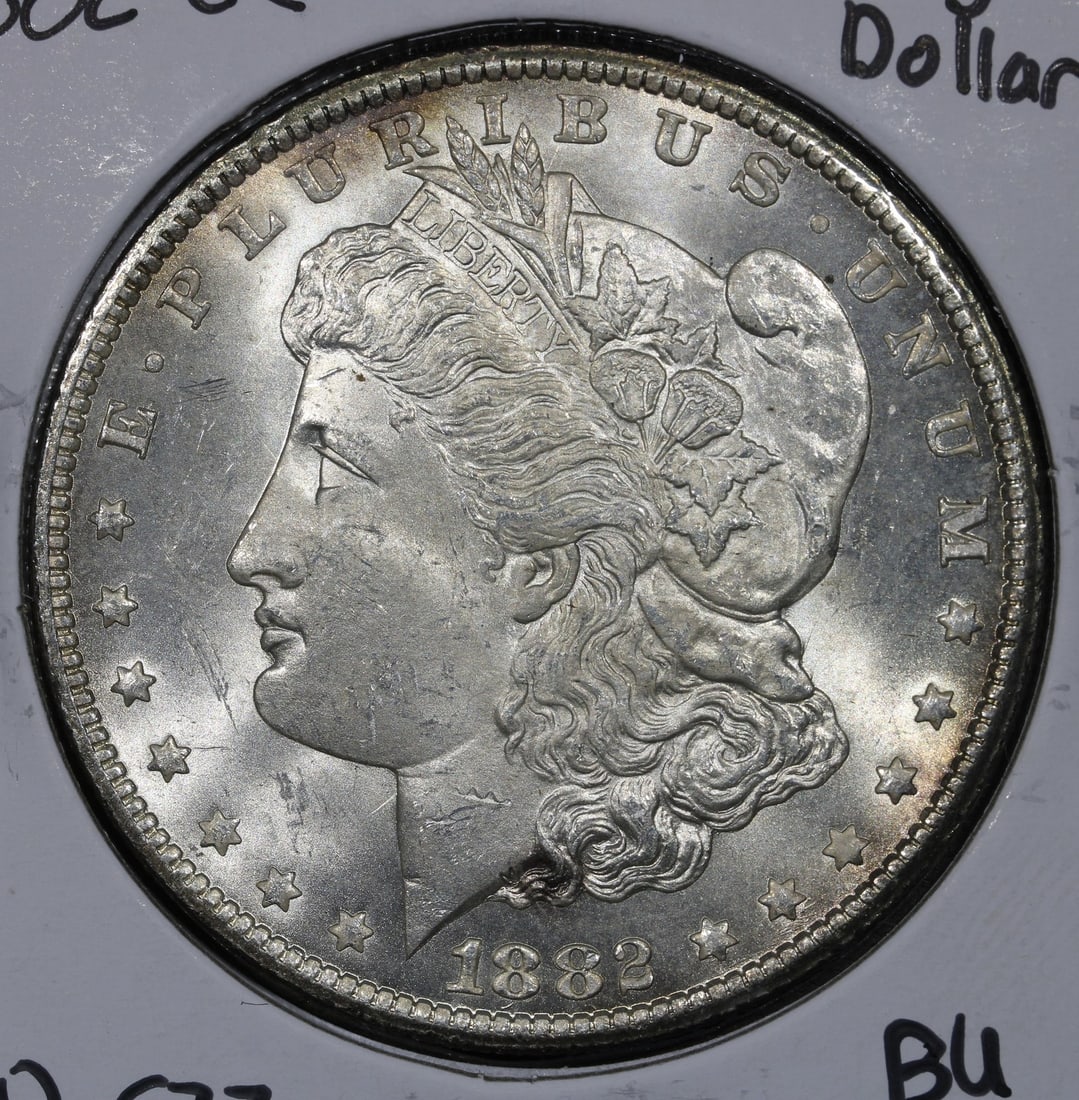 Carson City 1882 Morgan Silver Dollar $1 Key Date: Carson City 1882 Morgan Silver Dollar $1 Key Date 1882-CC Morgan Silver Dollar $1 from the Carson City issue. This key date coin is described as BU uncirculated and is a pre-owned piece. Specification