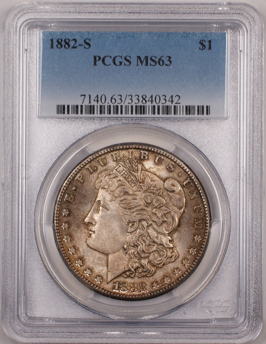 PCGS MS 63 1882 S Morgan $1 Silver Dollar Toned: PCGS MS 63 1882 S Morgan $1 Silver Dollar Toned This is an 1882-S Morgan Silver Dollar graded MS-63 by PCGS. The coin is uncirculated, has a toned appearance, and was minted in San Francisco. It is co