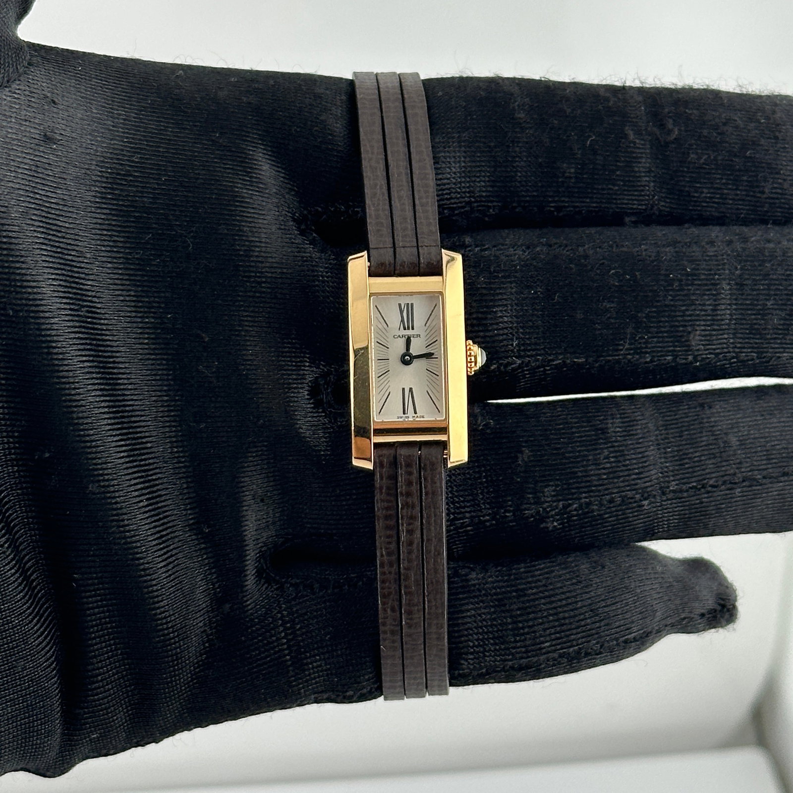 Cartier Allongee Lanieres Ladies Watch Silver Dial Leather Strap Ref. 2593: Cartier Allongee Lanieres Ladies Watch Silver Dial Leather Strap Ref. 2593 This ladies' Cartier Allongee Lanieres watch features a silver dial and a leather bracelet. The timepiece is part of the Allo