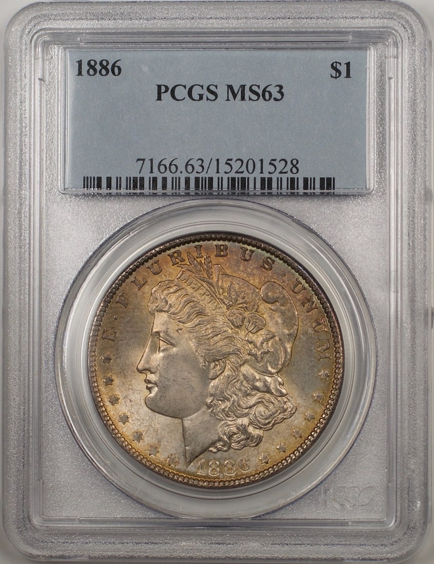 PCGS MS 63 1886 Morgan Silver Dollar Philadelphia Toned Uncirculated Coin: PCGS MS 63 1886 Morgan Silver Dollar Philadelphia Toned Uncirculated Coin This 1886 Morgan Silver Dollar is certified by PCGS with a grade of MS 63, indicating an uncirculated condition. The coin feat