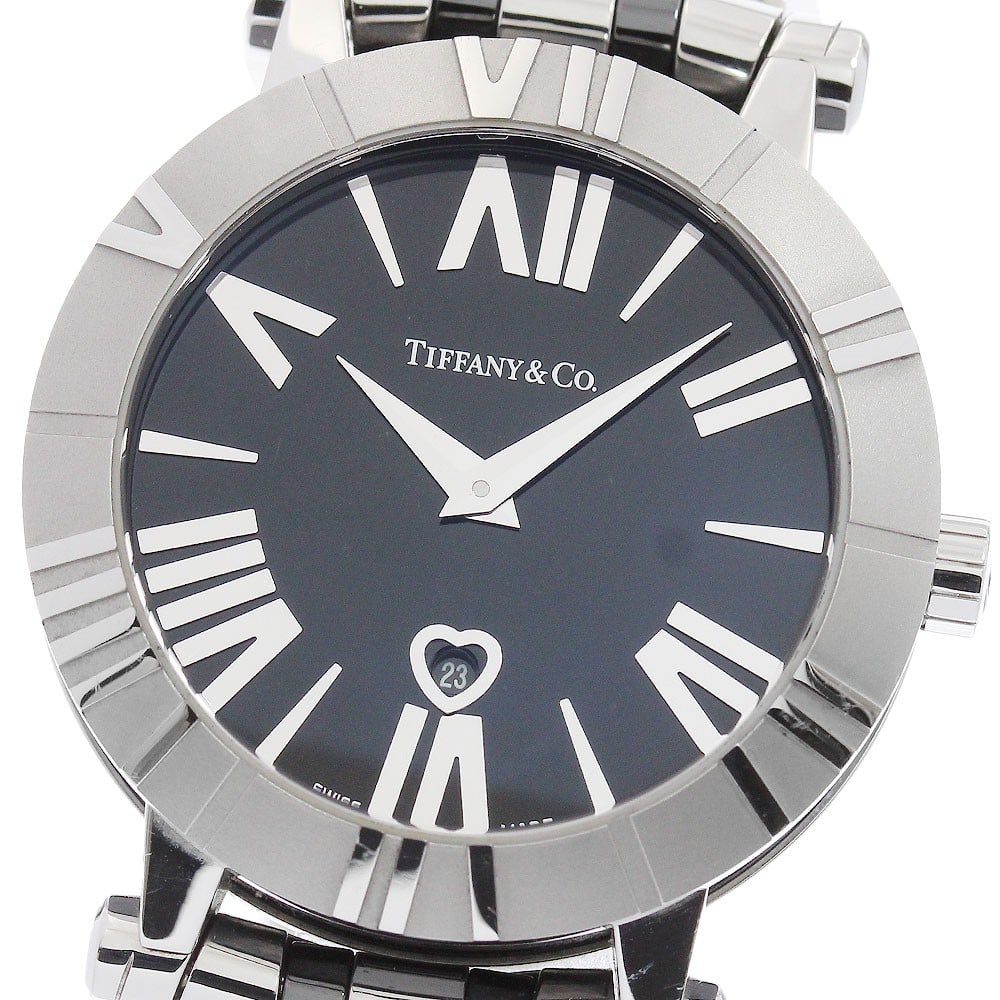 Tiffany Co Atlas women's quartz date watch ref Z1301.11.11A10A00A: Tiffany Co Atlas women's quartz date watch ref Z1301.11.11A10A00A Tiffany & Co. Atlas ladies' wristwatch with a black dial and quartz movement. This watch features a date display and a stainless steel